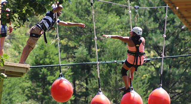 Children on climbing ropes