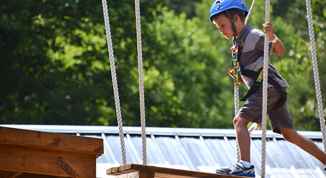 Child on adventure course